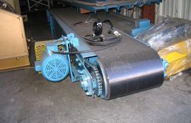 Объект: Ленточный конвейер для транспортировки коробок с мебелью весом 25 кг